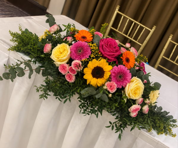 Wedding table flowers and venue arrangements