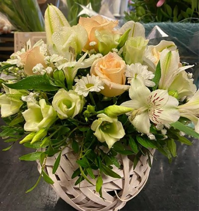 Timeless Wonder - This beautiful arrangement is created using white, cream and green flowers then perfectly arranged in a complimentary basket. Created and delivered in Carluke by Moody Cows Florist.
